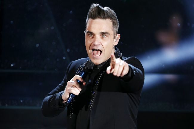 Robbie Williams anuncia turnê de 2025 com o mesmo nome do docudrama CGI-monkey