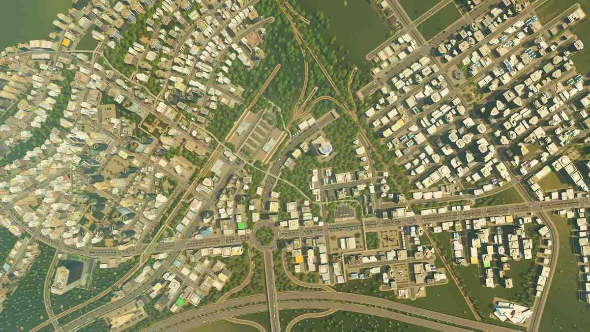 Uma visão panorâmica de um layout urbano denso com estradas, edifícios residenciais e comerciais em Cities: Skylines